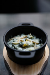 Spinach Cheese Bake on wooden plate apptizer