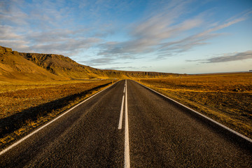 Fototapeta na wymiar Road through iceland landscape. Road travel concept. Car travel adventure. Beautiful landscape in Iceland.