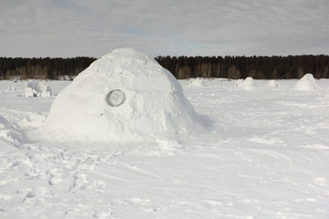 Igloo  standing on a snowy glade  in the winter, Novosibirsk, Russia