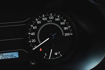Naklejka premium Car speedometer with kilometer per hour and fuel meter,fasten belt warning light.