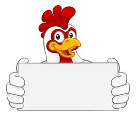 A chicken rooster cockerel cartoon character mascot holding a sign