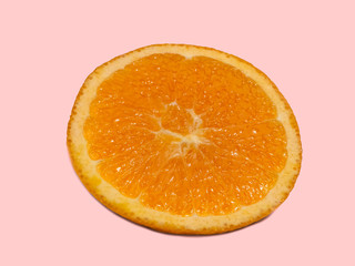 Orange ball that split down the middle on pink background with clipping