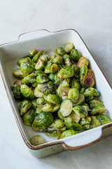 Homemade Roasted Brussel Sprouts in Porcelain Bowl.