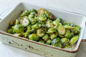 Homemade Roasted Brussel Sprouts in Porcelain Bowl.