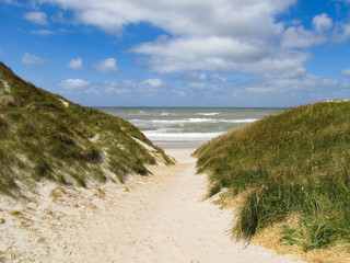 Fototapeta na wymiar Beatiful sight of North sea and the beach near Lyngvig Lighthouse in Denmark.