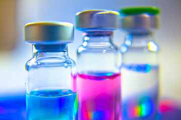 Vaccine vial dose flu shot drug needle syringe,medical concept vaccination hypodermic injection treatment disease care hospital prevention immunization illness disease baby background.