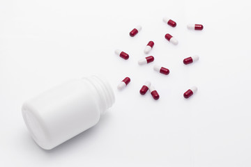 Vitamins in the form of tablets are  on the table