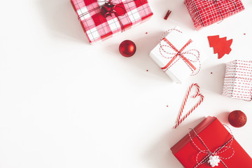 Fototapeta premium Christmas composition. Gift box, christmas decorations on white background. Flat lay, top view, copy space