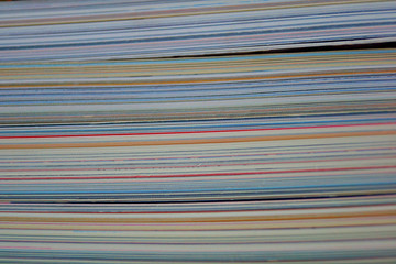 stack of colored magazine pages
