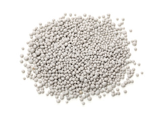 Gray fertilizer on white background