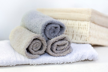 Fototapeta na wymiar Stack of bath towels on background closeup