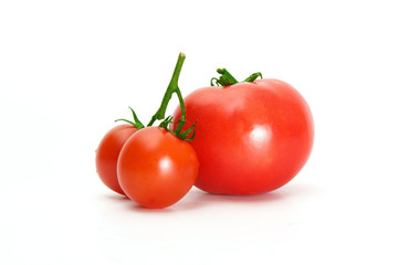 Delicious red tomato cherry on a white background.