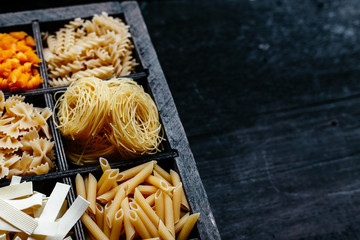 italian pasta in a box. Raw pasta. Farfale, cappelli angelo, spaghetti, cavatelli, noodles