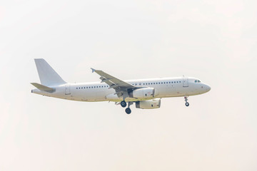 Airplane  flying over urban areas prepare landing