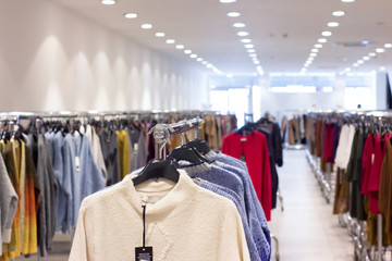 Clothing exposed in the showroom at factory. Selective focus