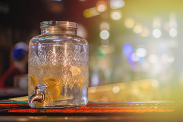 Bank with lemonade on the bar.