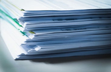 Preparing document. Green  and white paper. Business reports and Accounting of documents on Office background.