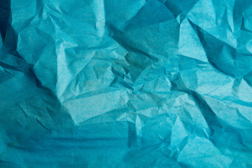 Old crumpled blue paper texture