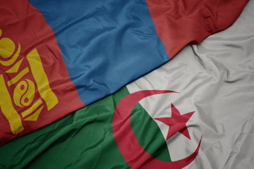 waving colorful flag of algeria and national flag of mongolia.