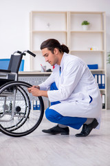 Young male doctor working in the clinic