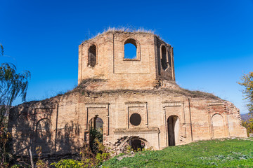 Fototapeta na wymiar Remains of the ancient Albanian church Kilwar in the Gilavar village, built in the 17th century