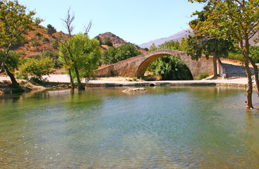 Fototapeta na wymiar Old venetian bridge in Crete