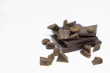 dark dark chocolate and coffee on a white background