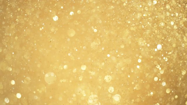 Golden Glitter Background in Super Slow Motion at 1000fps.