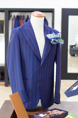 Mannequins in jacket in tailor shop and tailored suits. Concept of: tailoring, businessman, elegance.