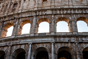 view of Rome Colosseum in Rome , Italy . The Colosseum was built in the time of Ancient Rome in the city center