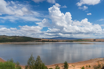 Beautiful landscape of Theewaterskloof dam with mountains on the background