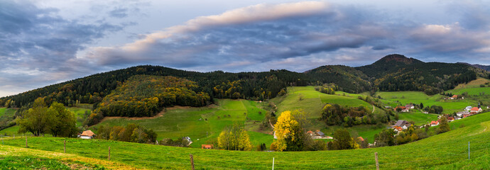Germany, XXL panorama of black forest village elzach houses and church in idyllic valley surrounded...
