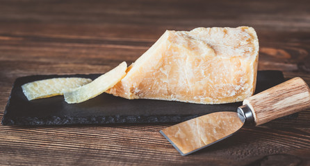 Parmesan cheese on stone board