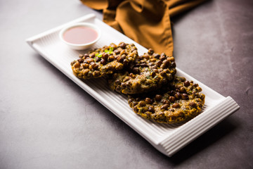 Chana Dal Bhabra / Babra served with tomato ketchup, popular food from Bihar / Bhojpur of India