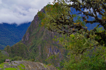Machu Picchu, legendary Inka capital Peruvian Andes. Historic and ancient ruins and stonewalls high...