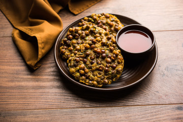 Chana Dal Bhabra / Babra served with tomato ketchup, popular food from Bihar / Bhojpur of India