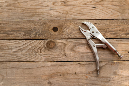 Top view of wrench on wood background and copy space