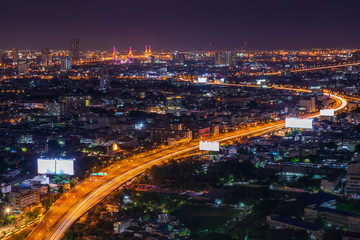 Naklejka na ściany i meble Bangkok City Scape. View of Thailand night view in the business location. Beautiful Bhumibol Bridge and river landscapes. Bangkok Thailand May 27, 2019