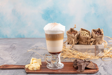Coffee latte in glass with chocolate. Cup of Coffee Latte