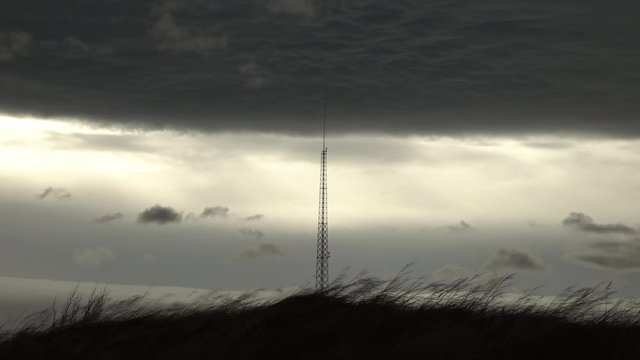 adio transmitter tower under dark stormy windy sky Iceland.mov