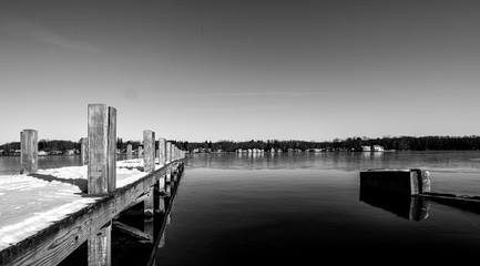 black and white of pier at Chautauqua lake in celeron new york 