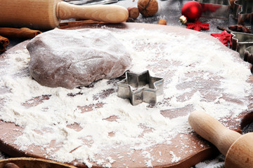 Baking christmas cookies. Typical cinnamon stars bakery with spices. xmas decoration on table