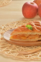 Apple pie on a wooden table