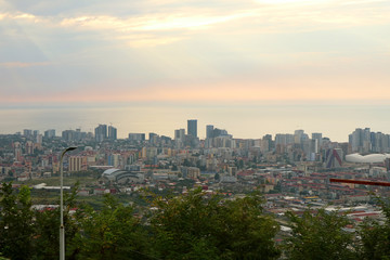 Fototapeta na wymiar Batumi City on the Coast of Black Sea at Sunset Seen from the Viewing Platform on Anuria Mountain, Batumi, Georgia