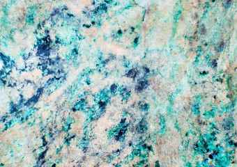 Fototapeta na wymiar Abstract texture, semiprecious motley multicolor stone, close-up, macro
