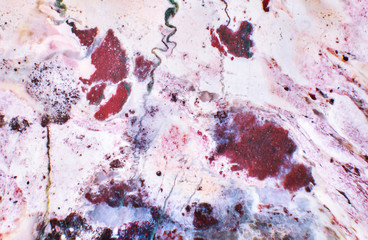 Abstract texture, semiprecious motley pink stone, closeup, macro