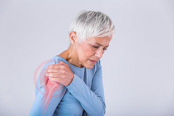 Senior woman with shoulder pain. Elderly woman is enduring awful ache. Shoulder Pain In An Elderly...