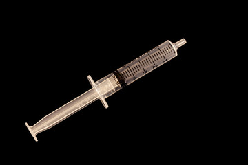 5ml syringe on black background