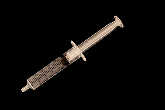 5ml syringe on black background