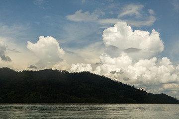 A cloud in the form of a face above the lake